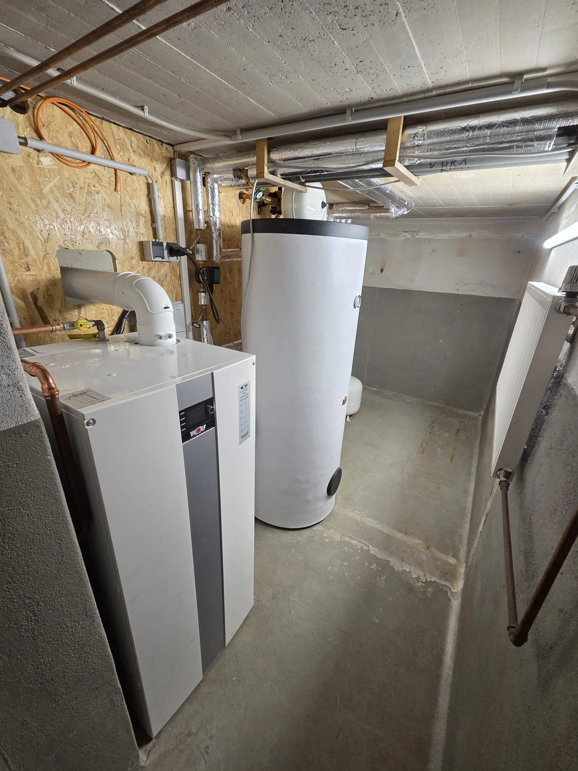 Fißmann - Heizung Sanitär Lüftung - Installation einer Heizungsanlage im Keller oder Hauswirtschaftsraum.