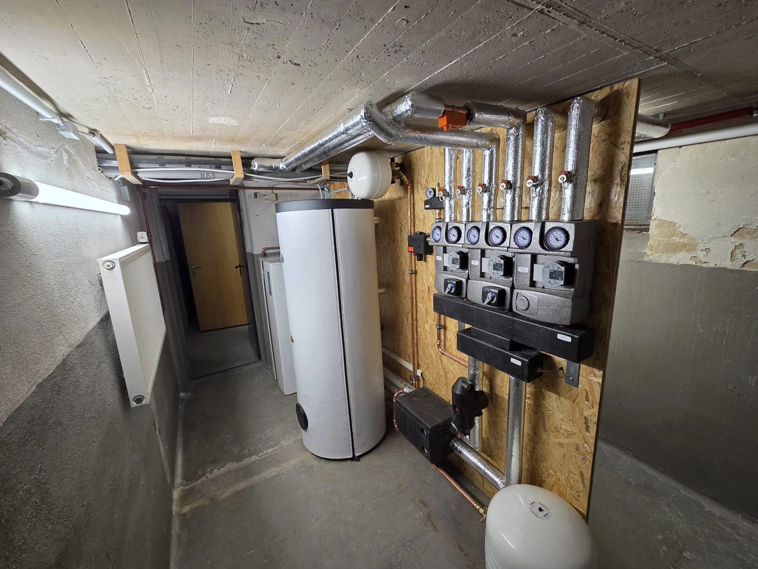 Fißmann - Heizung Sanitär Lüftung - Installation einer Heizungsanlage im Keller oder Hauswirtschaftsraum.